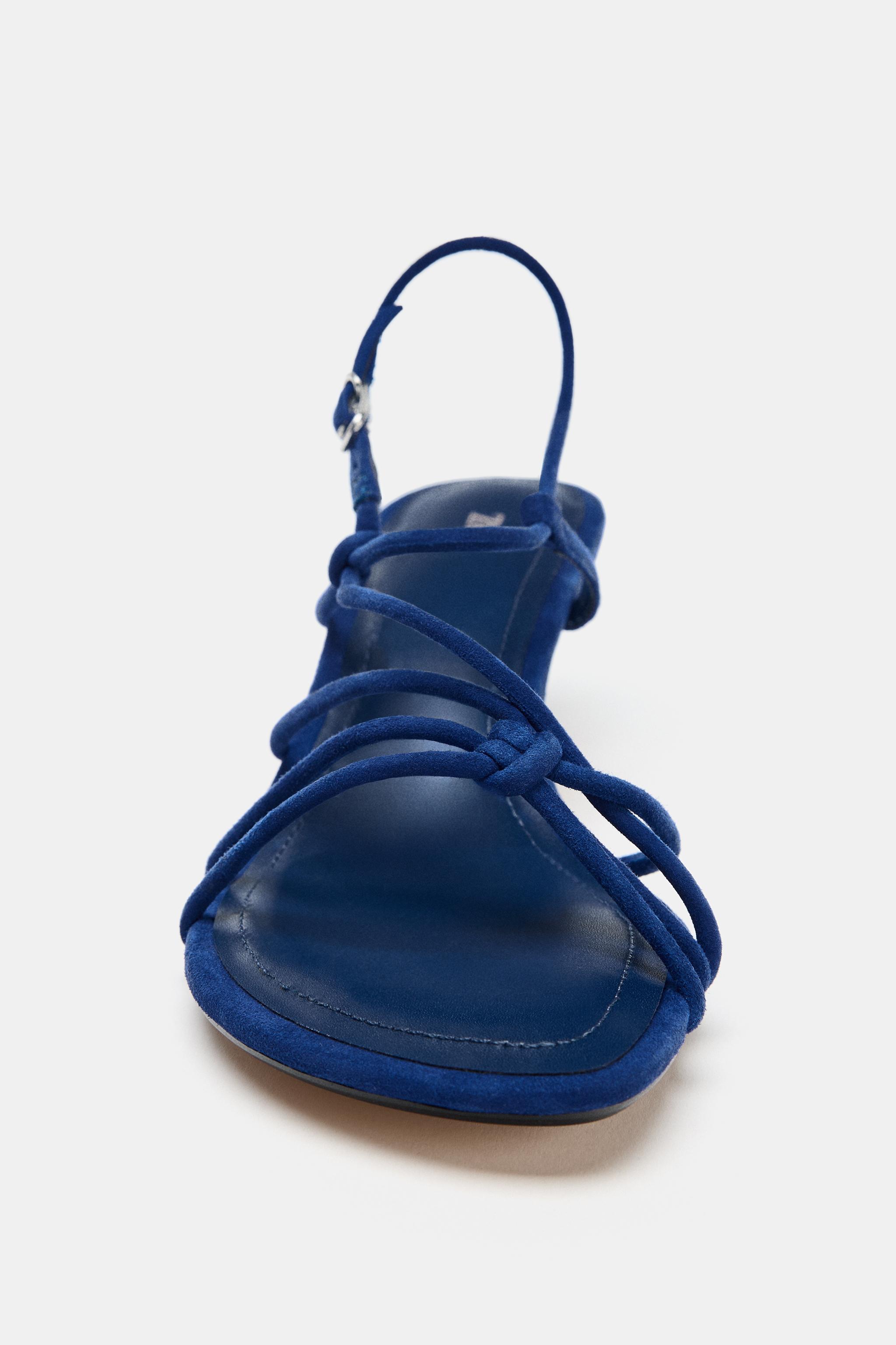 LEATHER HEELED SANDALS WITH KNOTS